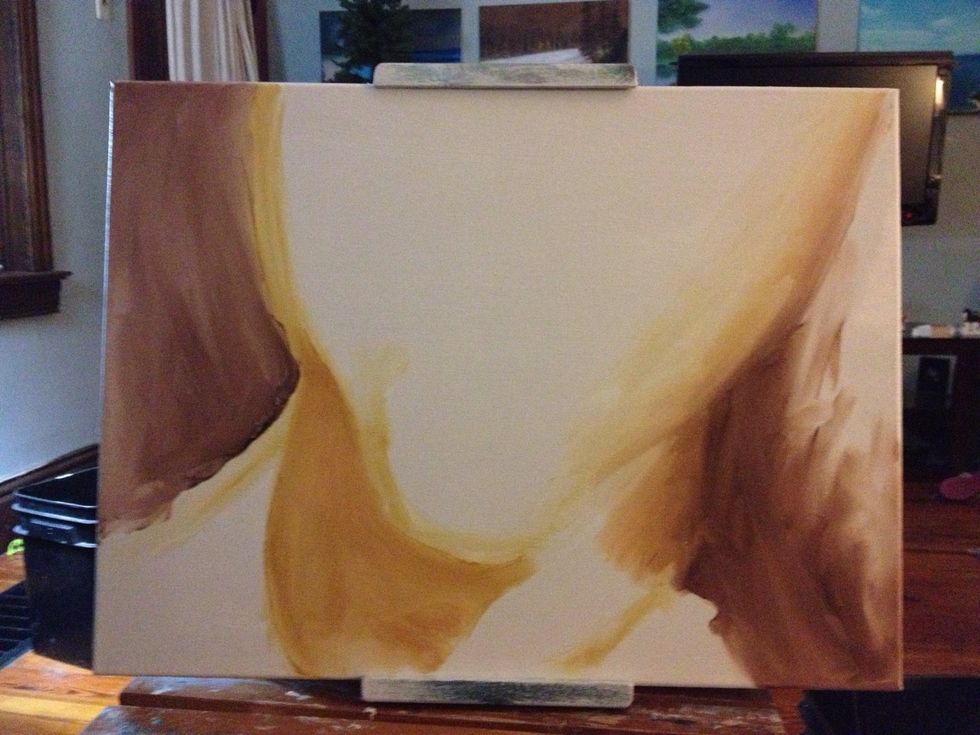 I add the background by scrubbing in a darker brown with my thumb. I then take medium brown and work in some shadow on the neck.