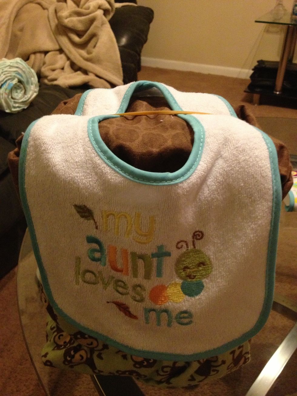 I added a bib to hang off the back. Secure with rubber band.  I am going to be a cool aunt ;)