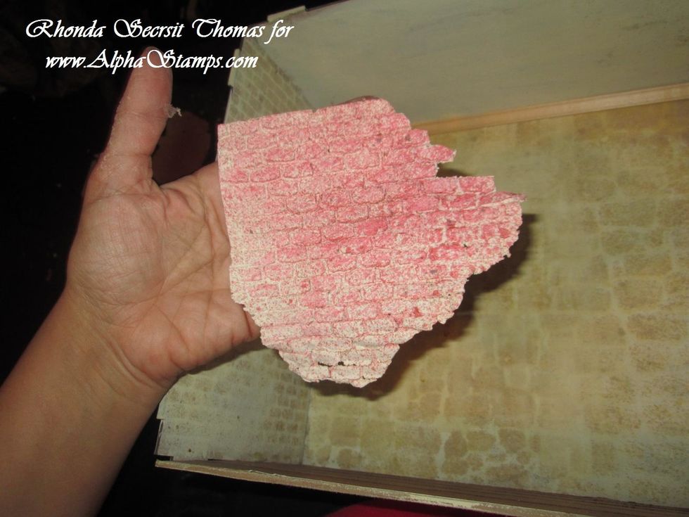 I added a bit of color which I then painted over a tad to make it look aged. You will notice I originally stenciled with walls with paint, but I wanted to have more texture thus the PaperClay.