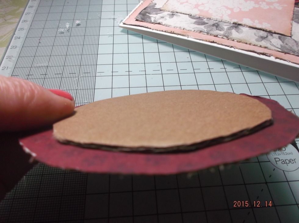 I added a circle of cardboard to the back of my sentiment to add some depth to the card.