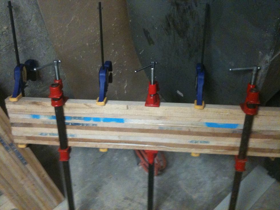 I added a couple of smaller clamps to help hold it together. I let this sit over night. This piece is the smaller board. It has 10 pieces and is 6 1/8" wide.