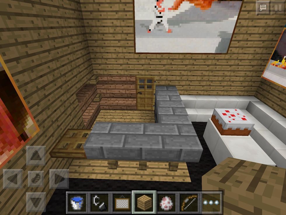 I added a small kitchen with shelves and a fridge.