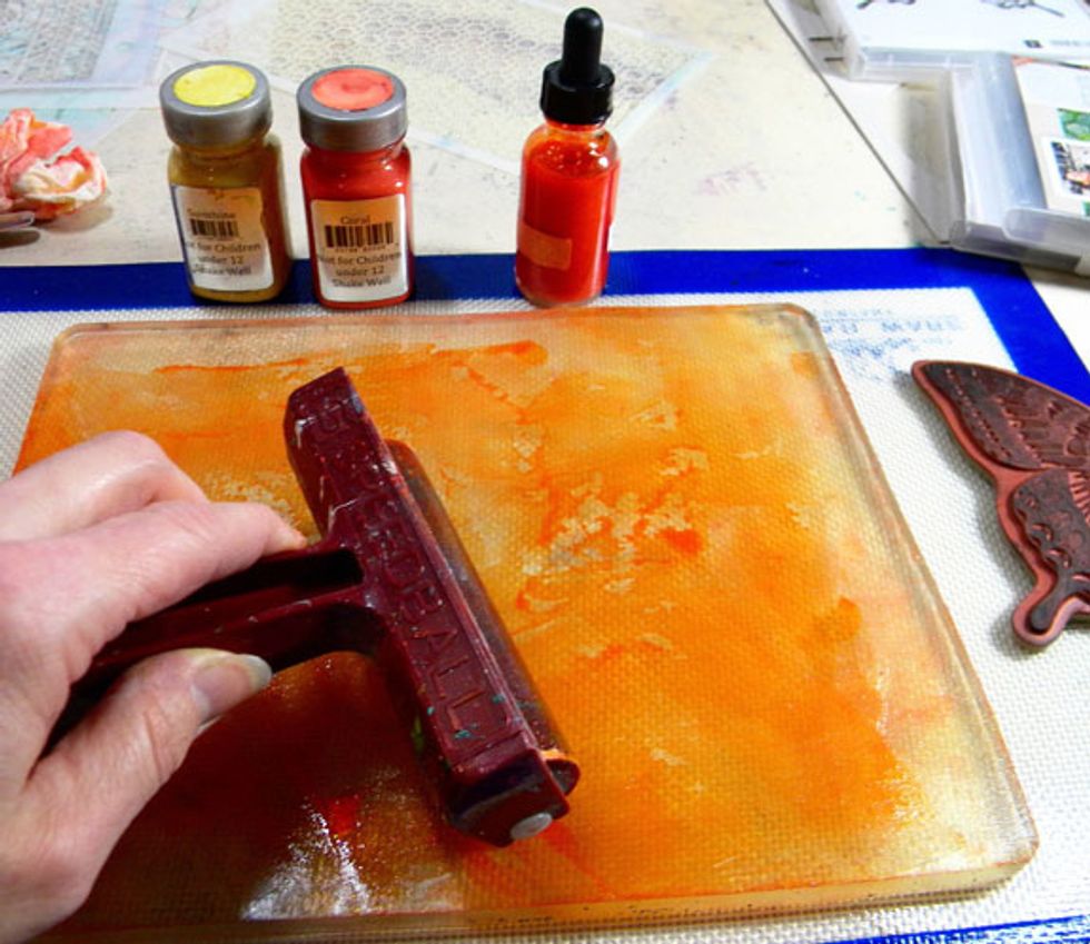 I added Coral and Sunshine and rolled it out.  Then I added a few drops of Indulgence (orange) and rolled that out.