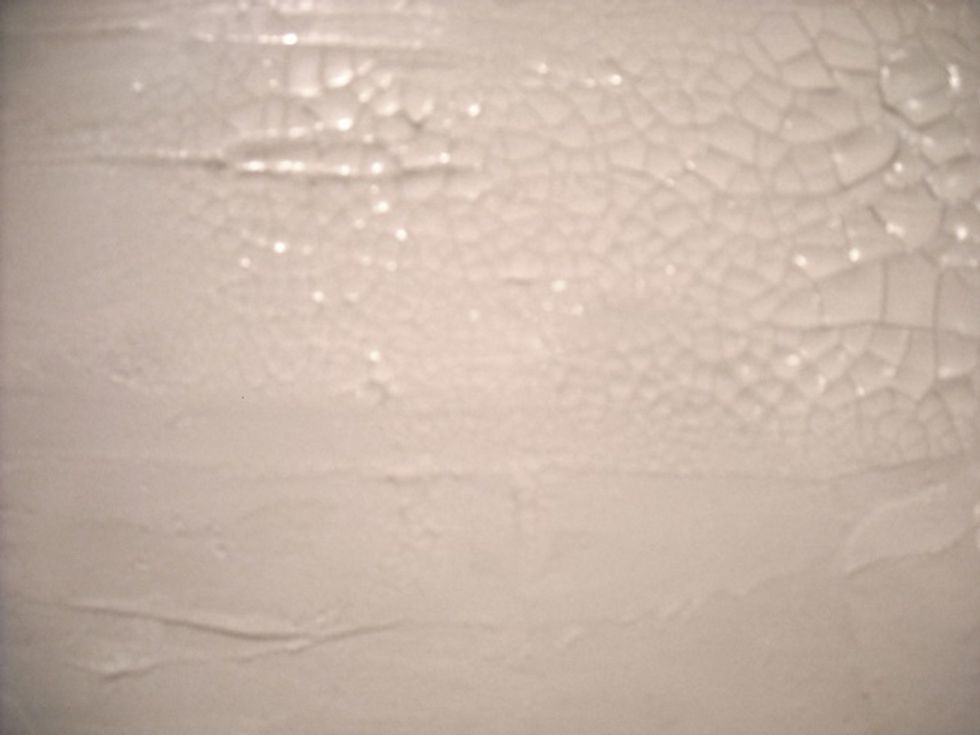 I added Deco Art Crackle Paste on large corner patches and lightly here and there in the center. And something happened I had not counted on!