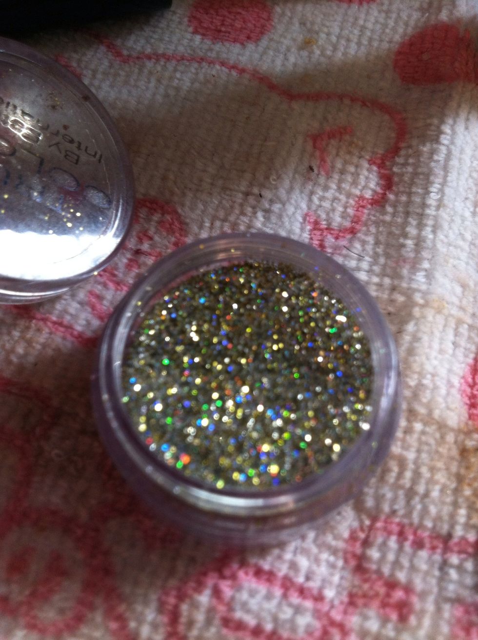 I added glitter for a glamorous shine and bling only to the inner part of my lips where I have applied snob and my gloss.