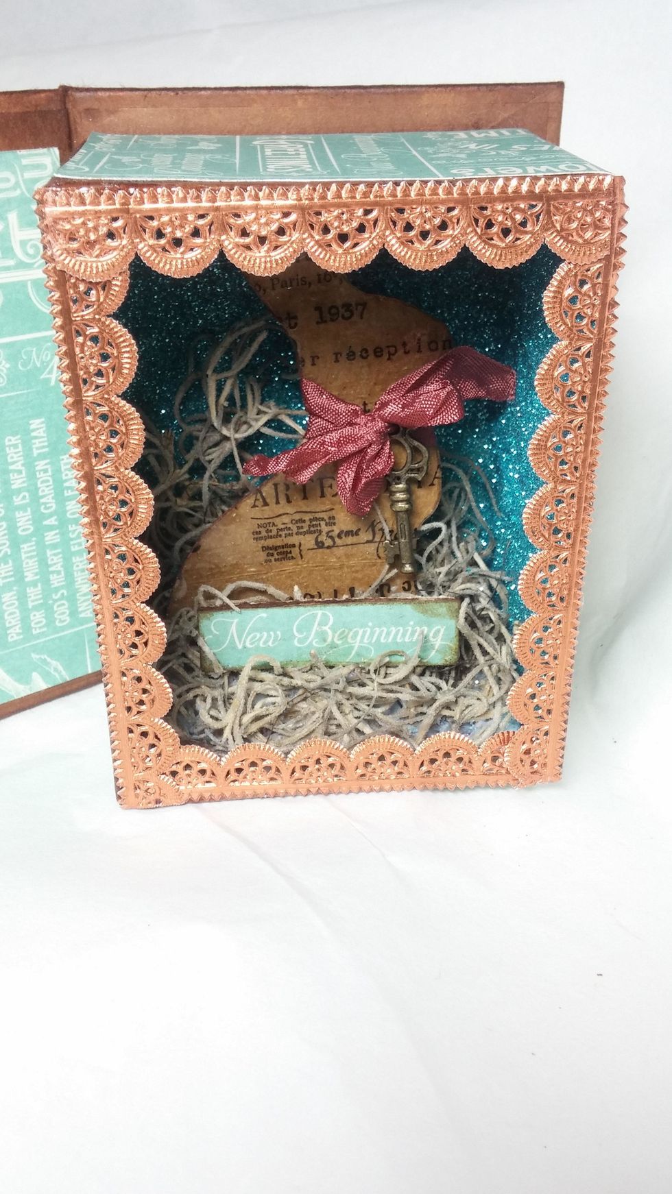 I added in more moss and a little sentiment to fill in the bottom more. The sentiment was cut from paper and backed with chipboard to make it nice and sturdy.