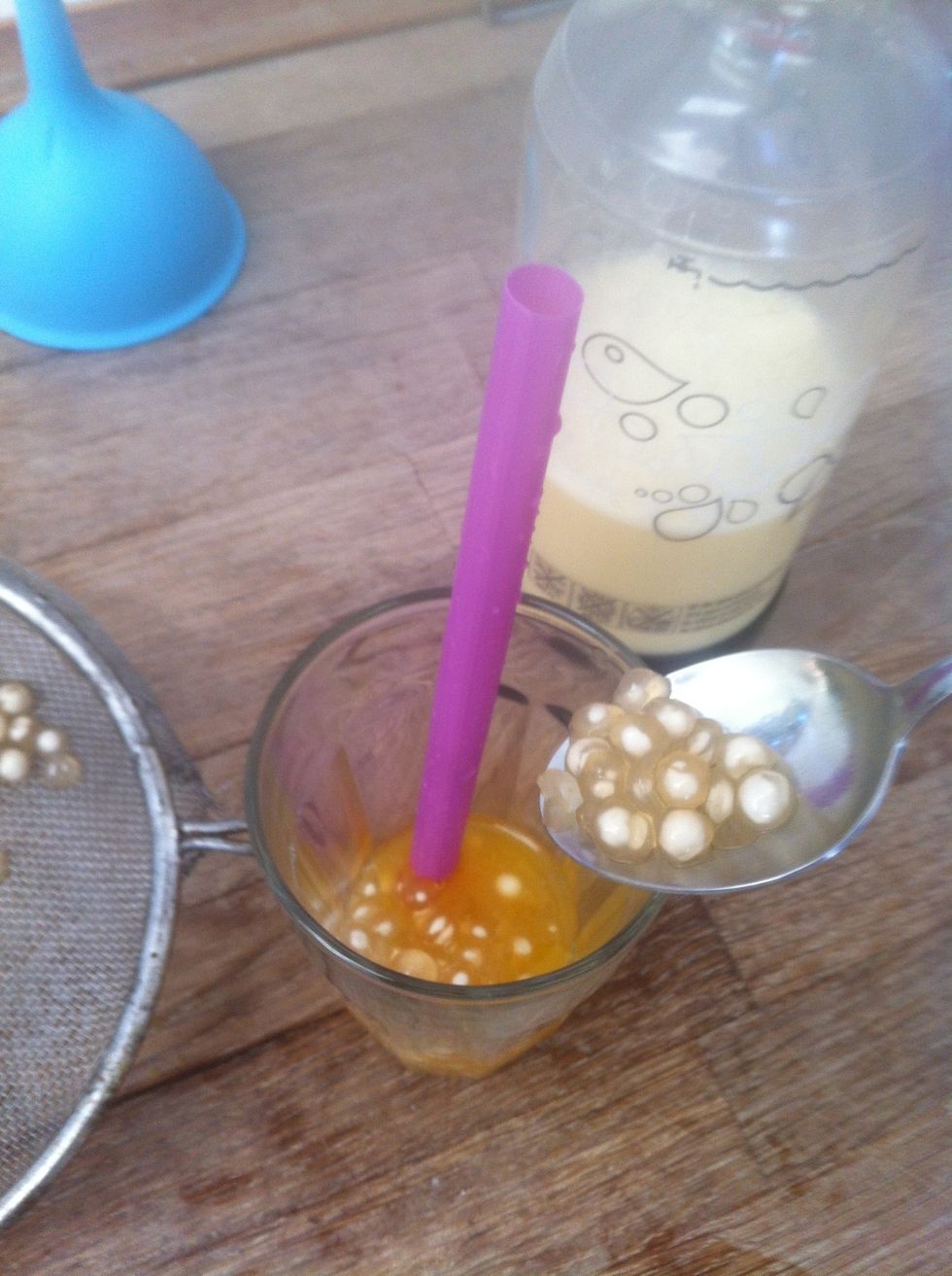 (I added mango pure at the bottom) pore some tapioca perls in.