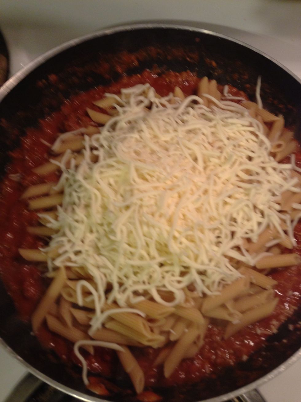 I added most of the bag of cheese as well, leave some for topping. Move quick because the cheese immediately starts melting...