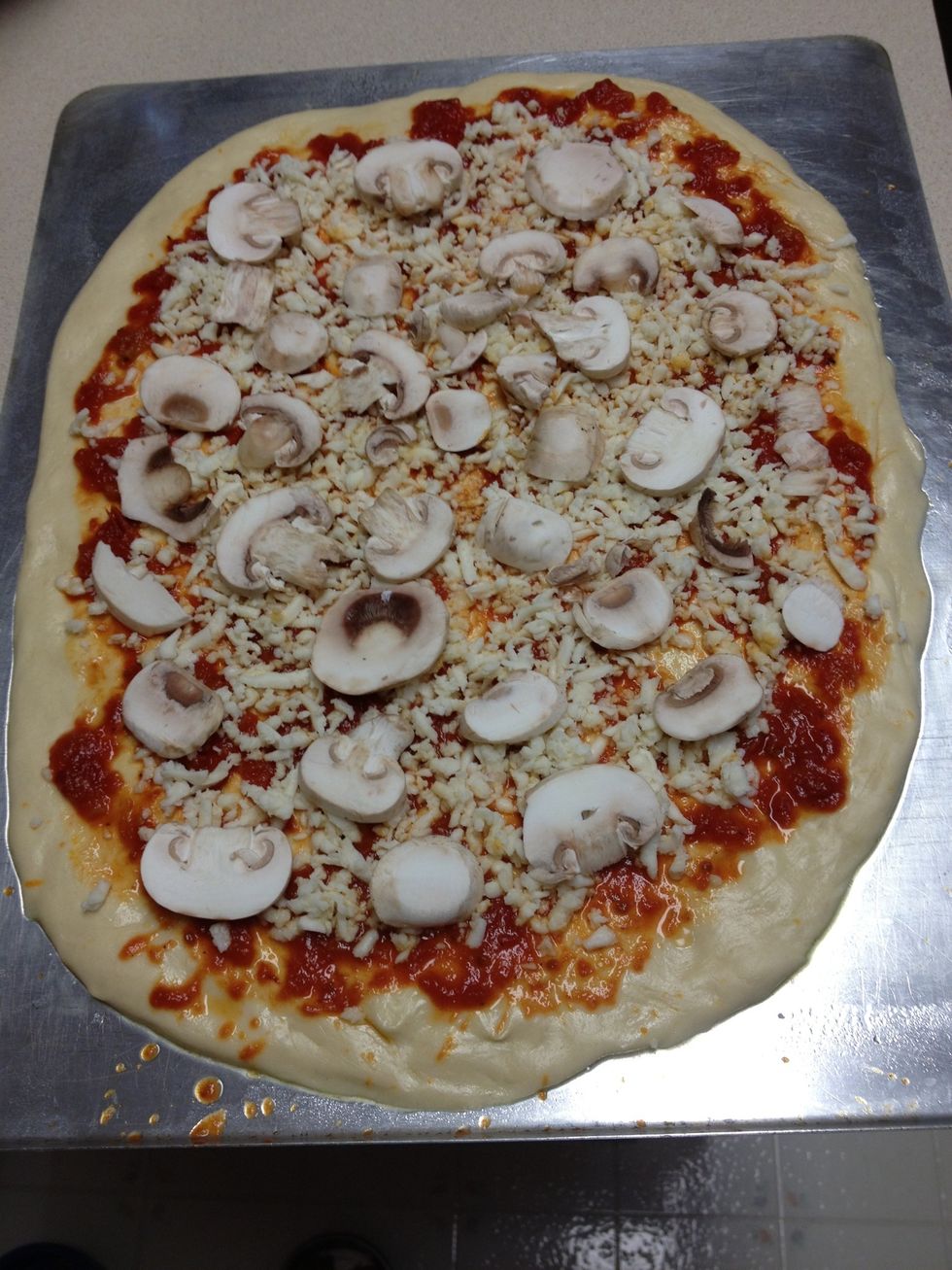 I added mushrooms to one and broccoli and ricotta to the other. Bake until crust is browned and cheese is melted and bubbly. Once done baking, let pizza sit for five minutes to rest.