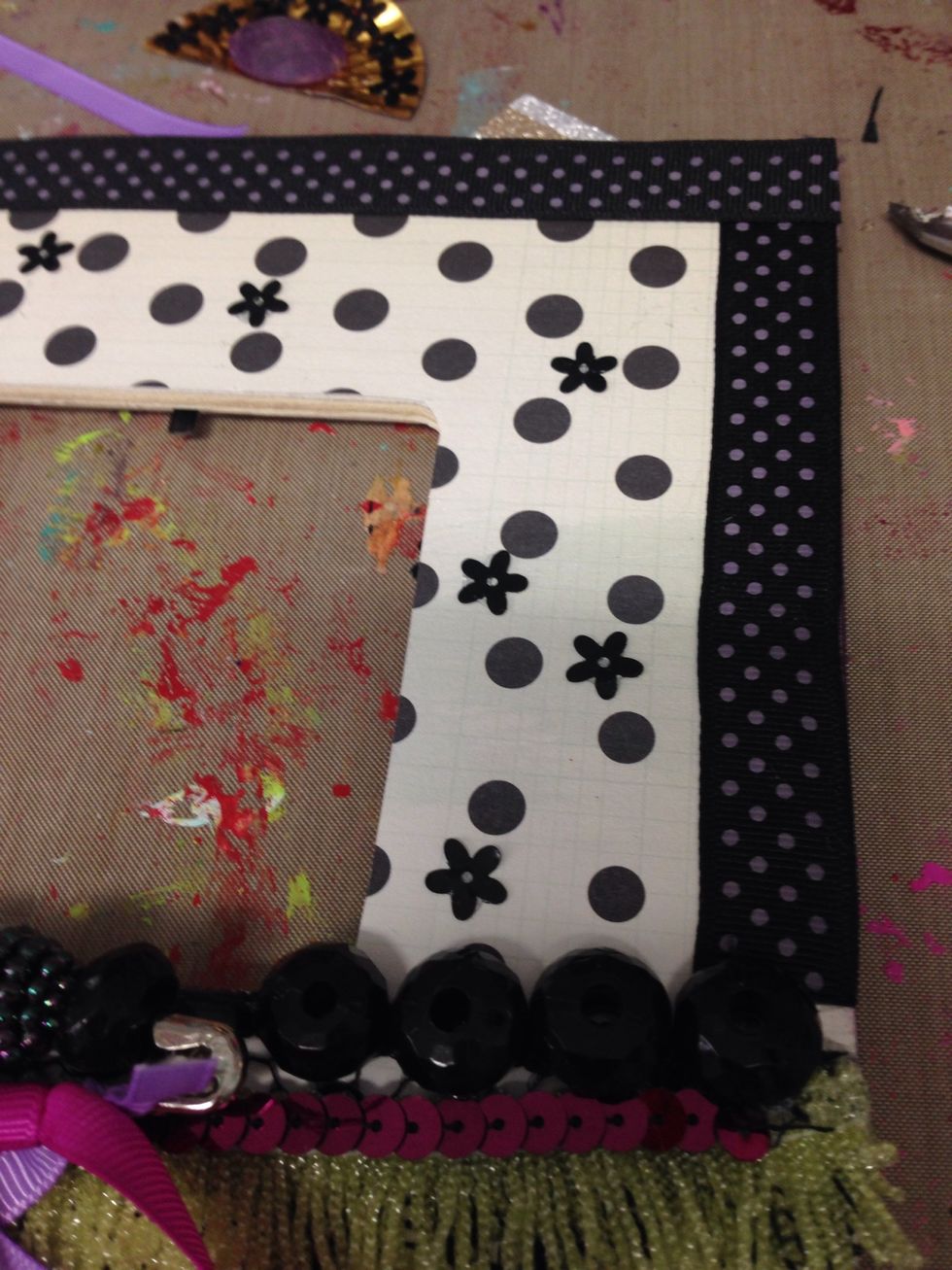 I added some ribbon trim around the edges and hot glued some of the flower sequins around the polka dots