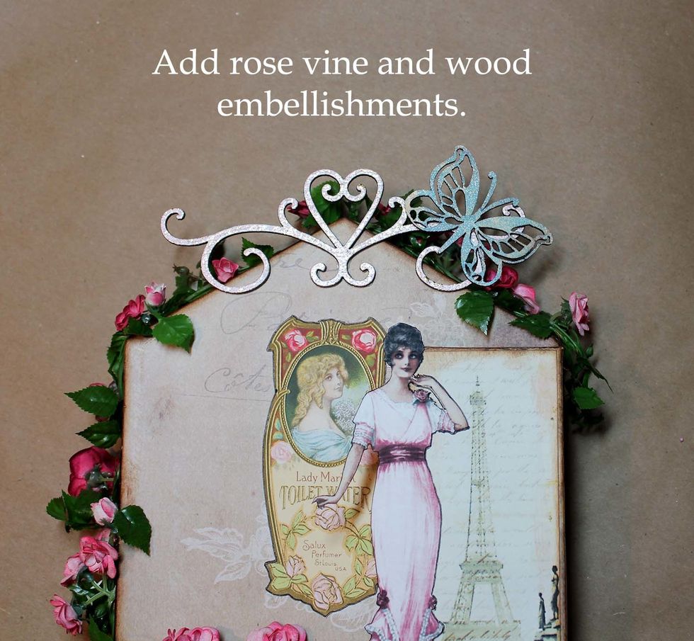 I added the rose garland first, then the wood embellishments. I needed to staple the garland in a couple places to hold in place, then glued extra flowers and leaves over the staples to hide them.