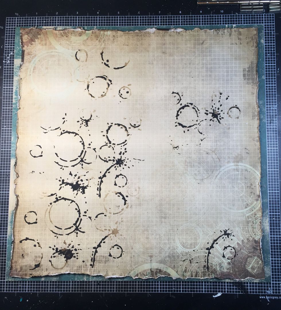 I added the stenciling to the paper where I knew it would "peek out" of my paper layers.