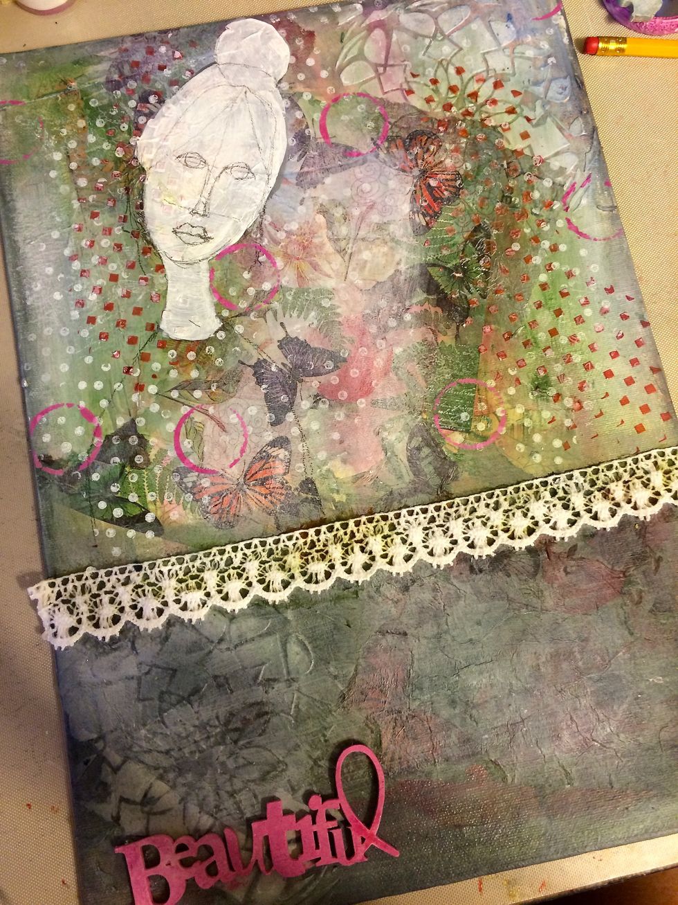 I added trim to the canvas where the sprayed portion meets the non-sprayed portion of the canvas. I painted the Beautiful Wood element with Enchanting and Immaculate Minx that I had mixed together.