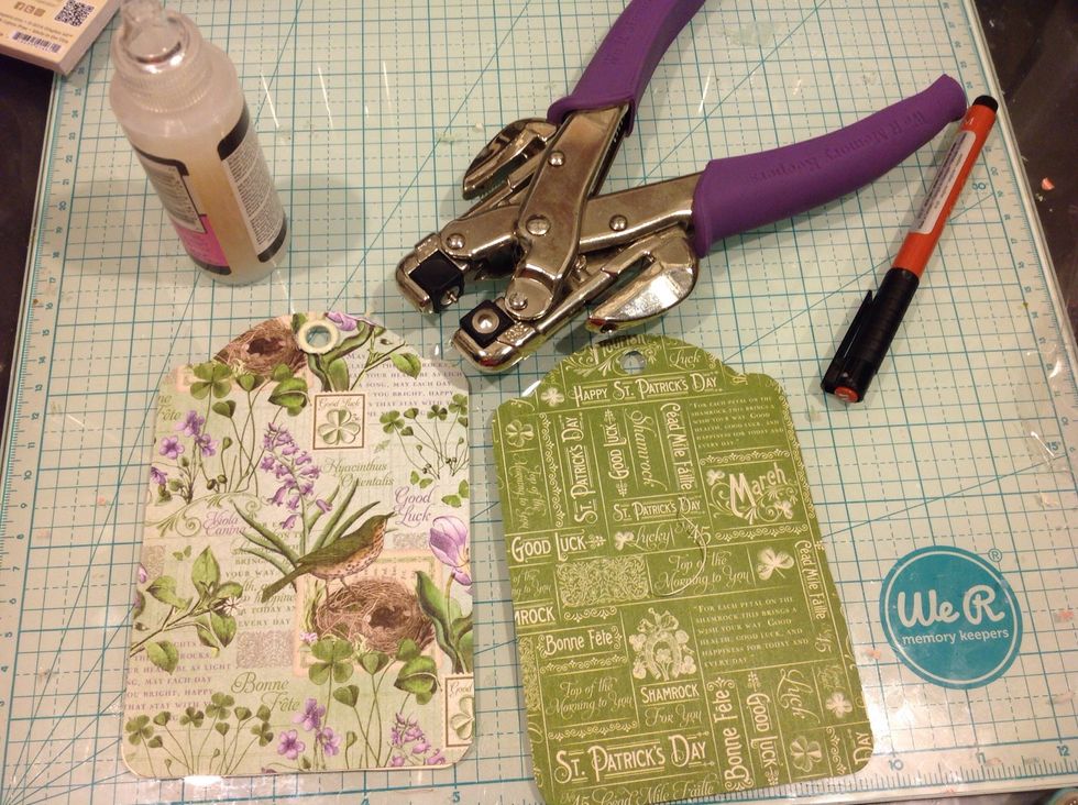 I adhered my paper with glossy accents and punched my holes with my Crop a dile.