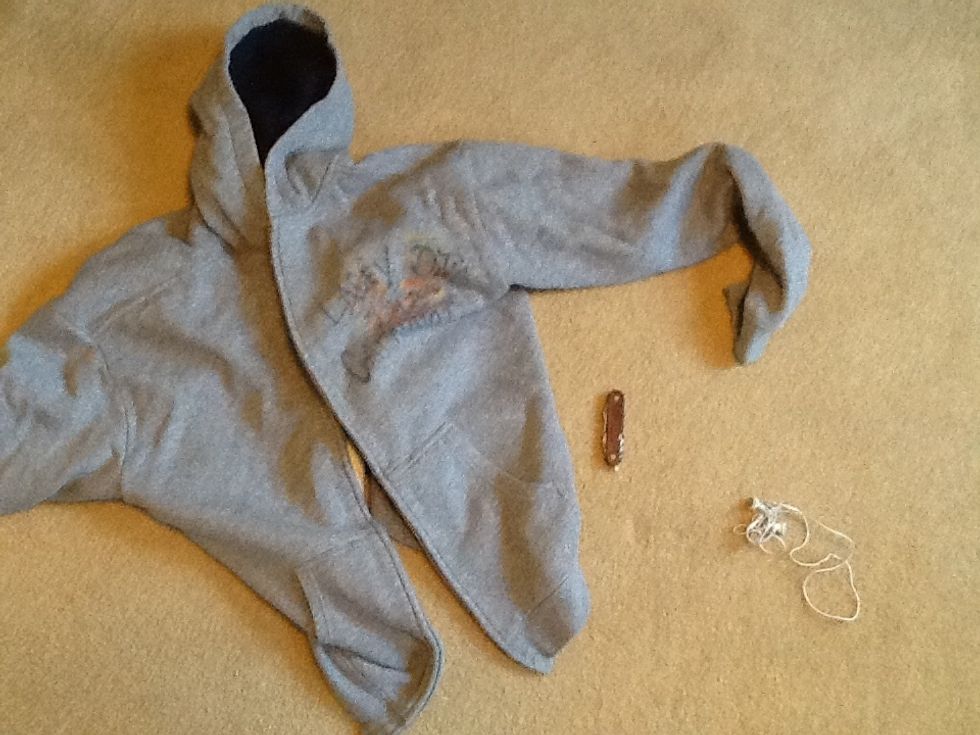 I already did this ahead of time but you will be making a few small incisions in the sweatshirt