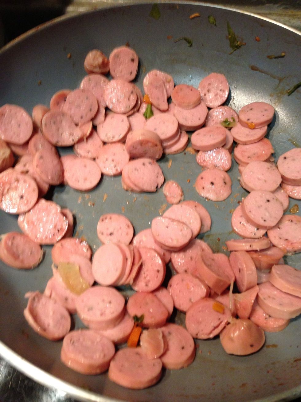 I also add black pepper beef sausage in it. Transfer it to plate, spread it out to cold slightly.