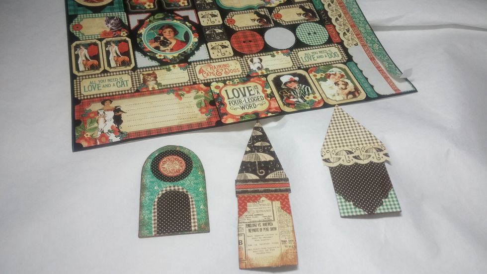 I also added a few sticker elements to contribute to the layered look of the houses.