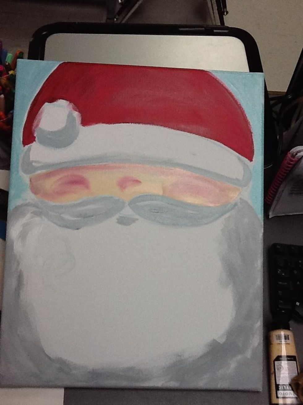 I also added a little bit of the light blue to give the grey a cooler tone. Use the grey to paint a shadow under the puff ball and band of the hat, the mustache, and around the beard.