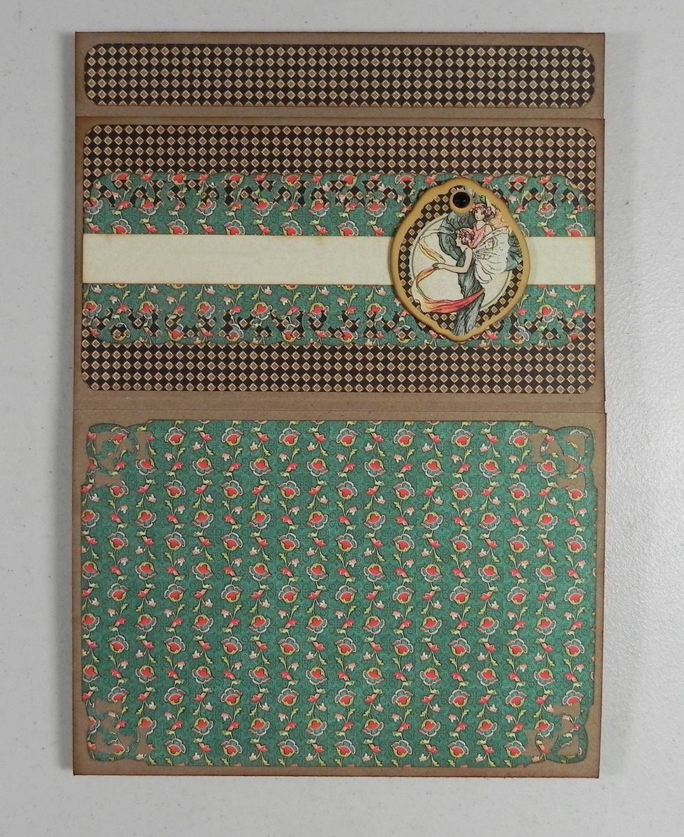 I also added a sticker from the collection on the 5/8" strip and bling on the chipboard piece. (Pictures at the end)