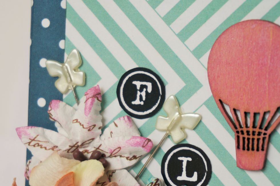 I also added the butterfly pins, small Kaisercraft balloon (which was inked to match), and the word "FLY" to the center!