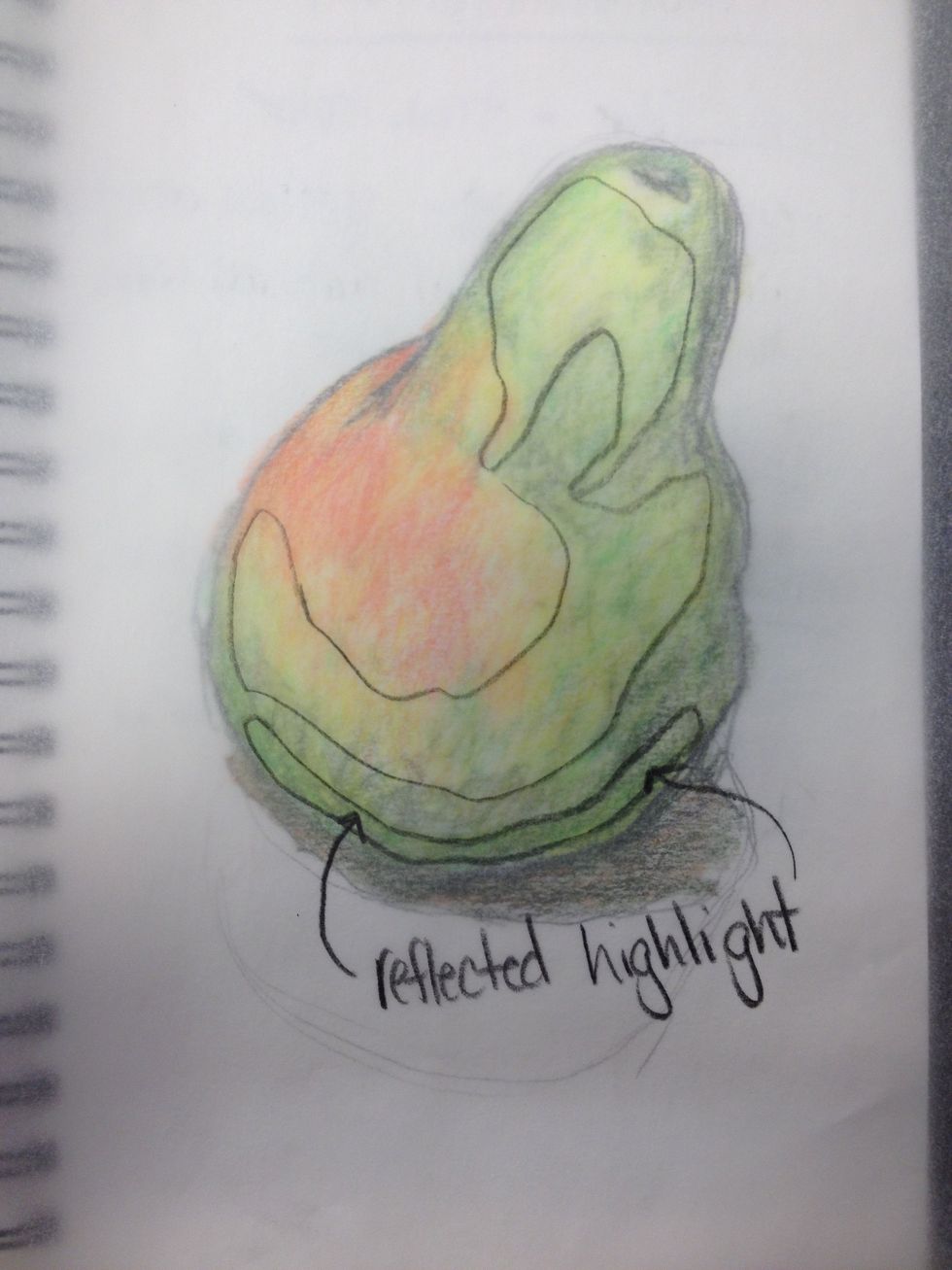 I also added the yellow green to account for the area where the table bounces light back on the pear. This is called a reflected highlight.