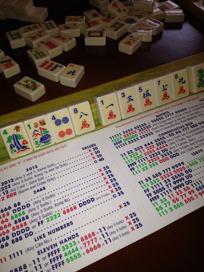 I also could use this 13579 hand that I have 5 tiles for, 11 33 555 777 9999. It would make sense to choose this hand since I have more tiles toward Maj.