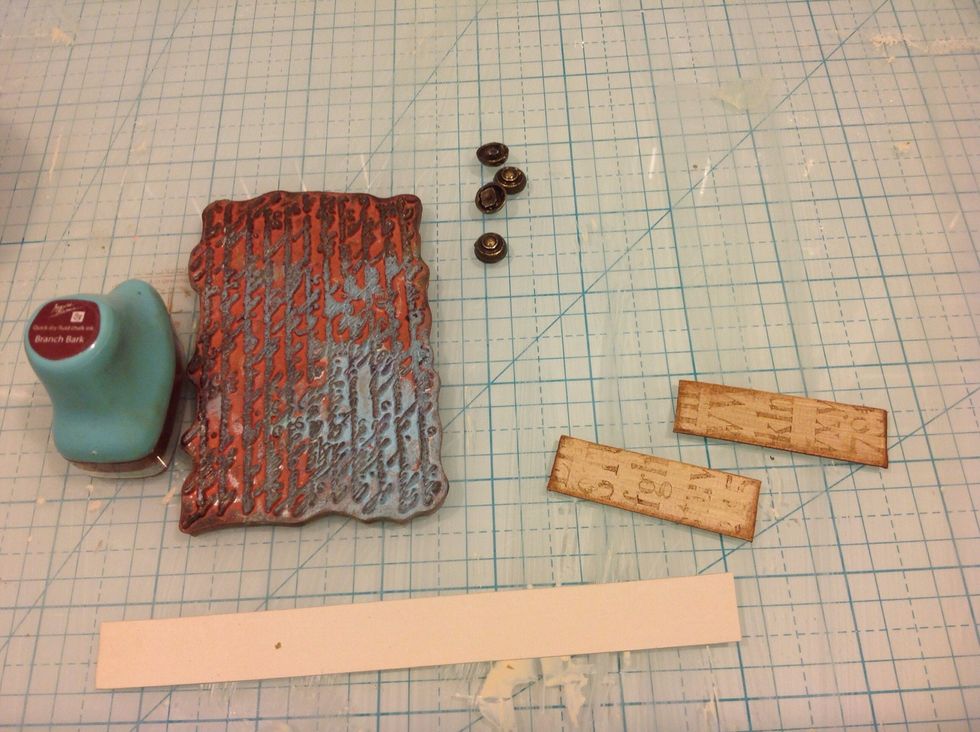 I also cut smaller strips and stamped them. I distressed them a bit darker.