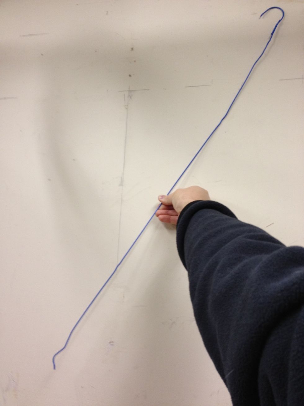 I also take a moment to fully extend the hanger and straighten the kinks.