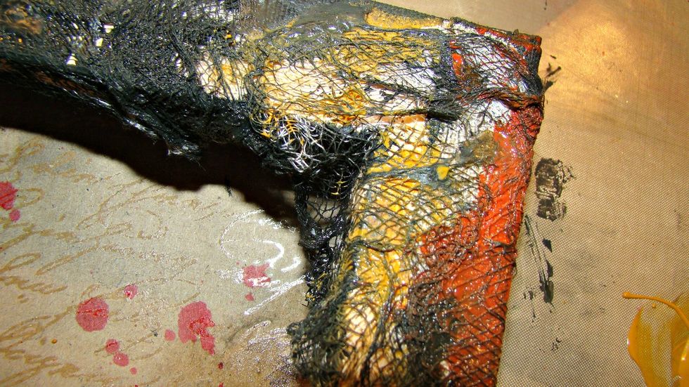 I also then applied AA's Velvet in Terracotta here and there on the canvas also. With the cheese cloth and the paints you achieve a nice creepy texture.