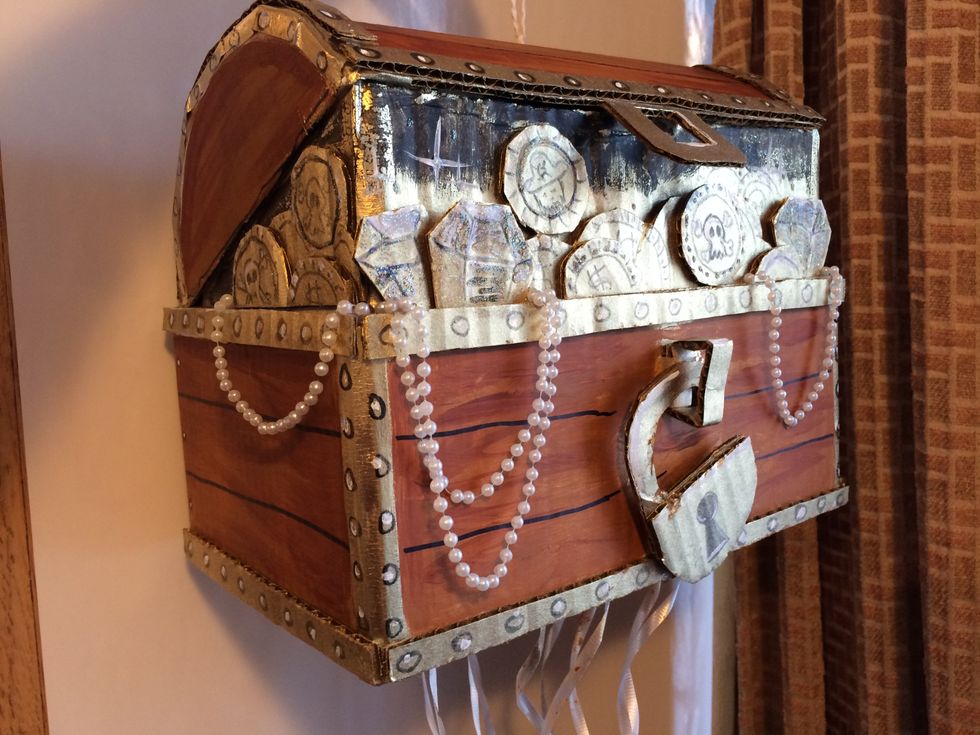 I also used black marker to add lines for wood planks, and to add a keyhole on the lock.