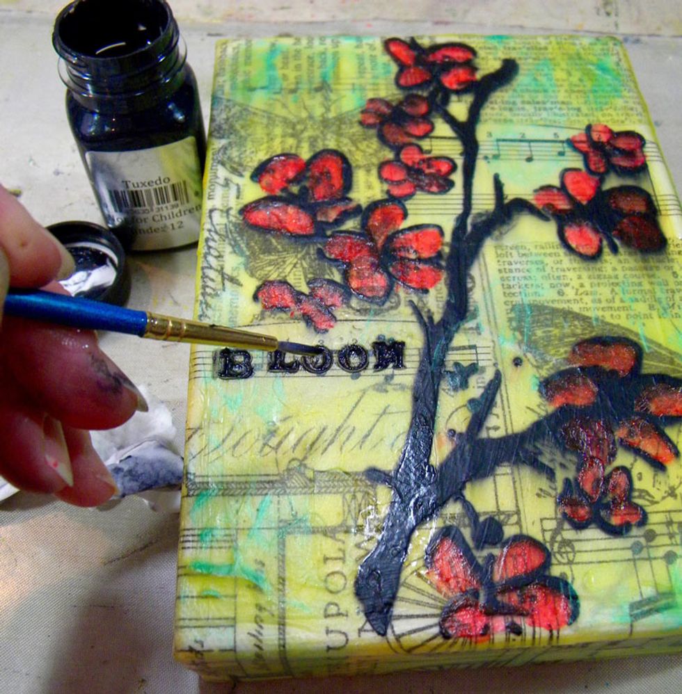 I also used the Hot Boss tool to make marks around the edges. To bring them out, paint Tuxedo Velvet over them and let it sit there for a few minutes before wiping it off with a baby wipe.