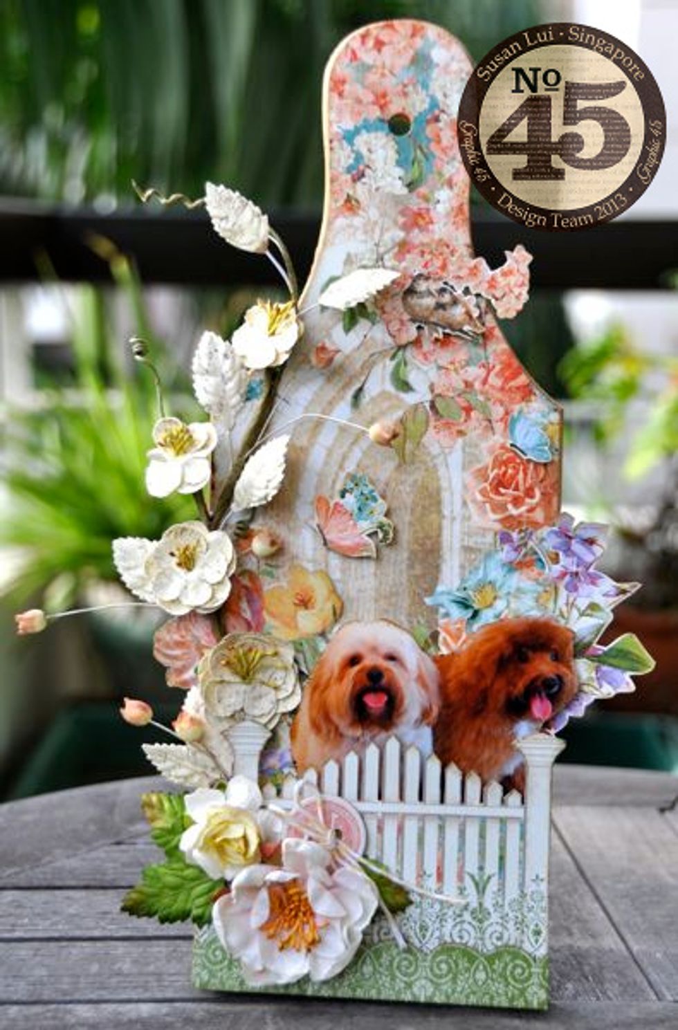 I altered this wooden cheeseboard into a photo display for my little doggies.