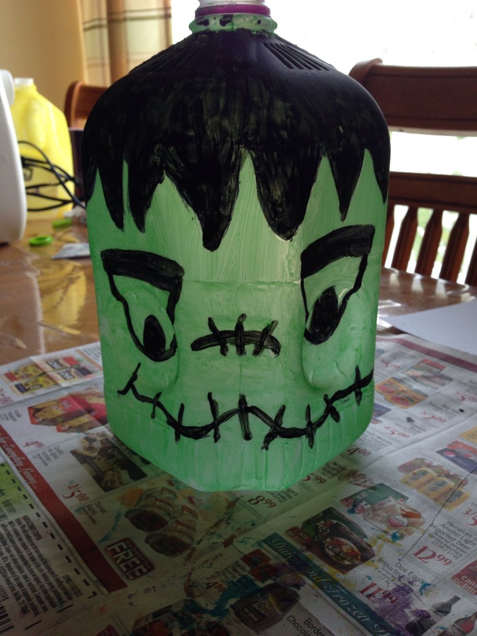 I am by no means even close to being an artist but it was fun trying out different faces on the jugs. This one is suppose to be Frankenstein.