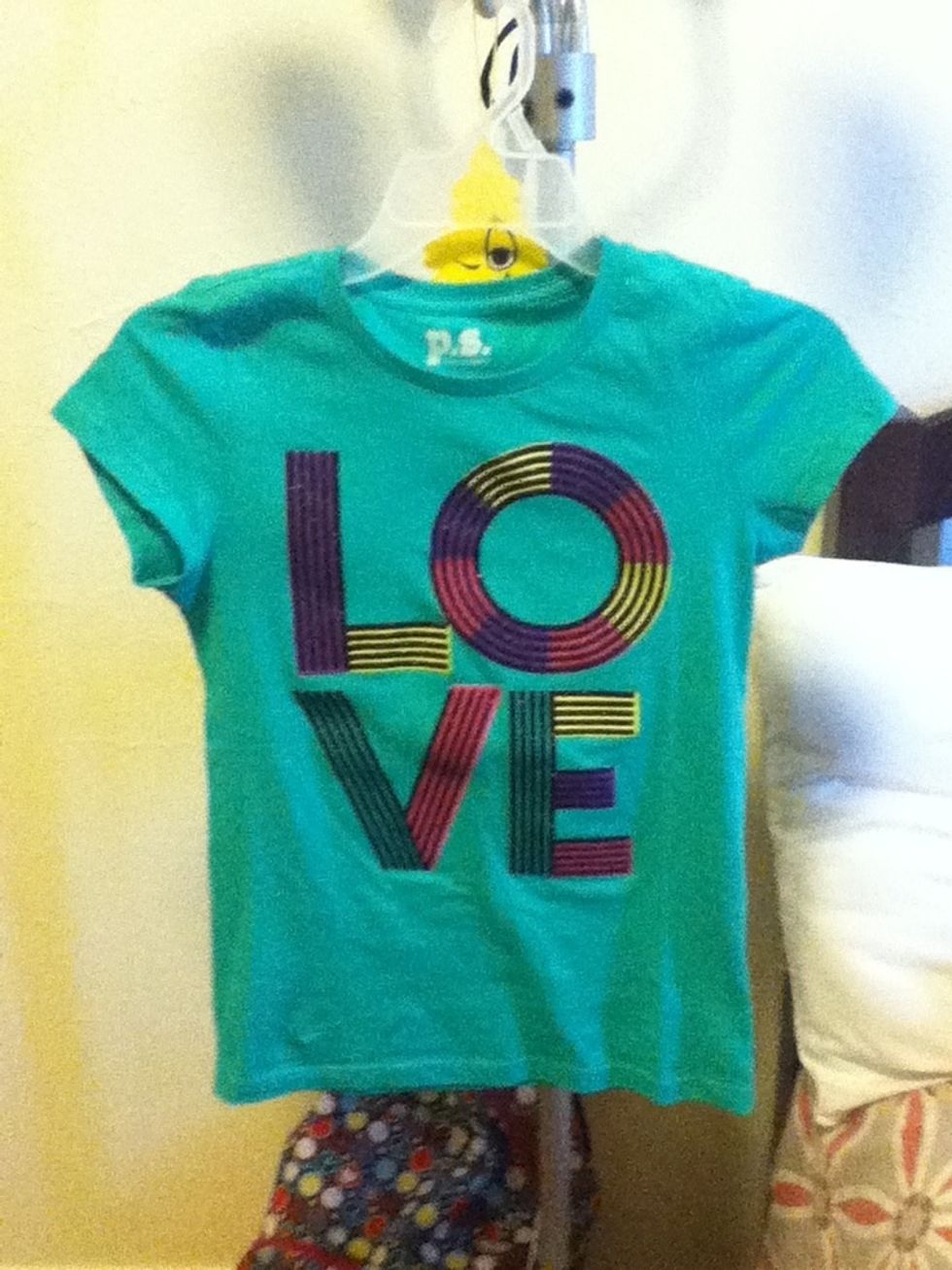 I am going to show you how to look good on a normal day.First i just bought this shirt so i took it out -ta da!