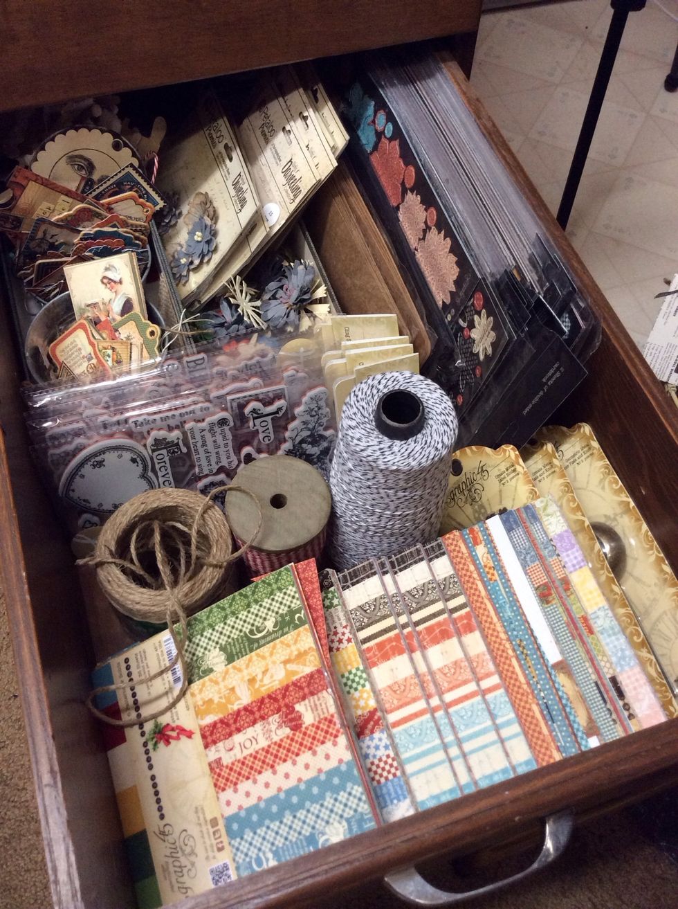 I am lucky enough to have these awesome, super deep built-in drawers in my studio. I stack and layer currently used items and rotate as needed from front to back.