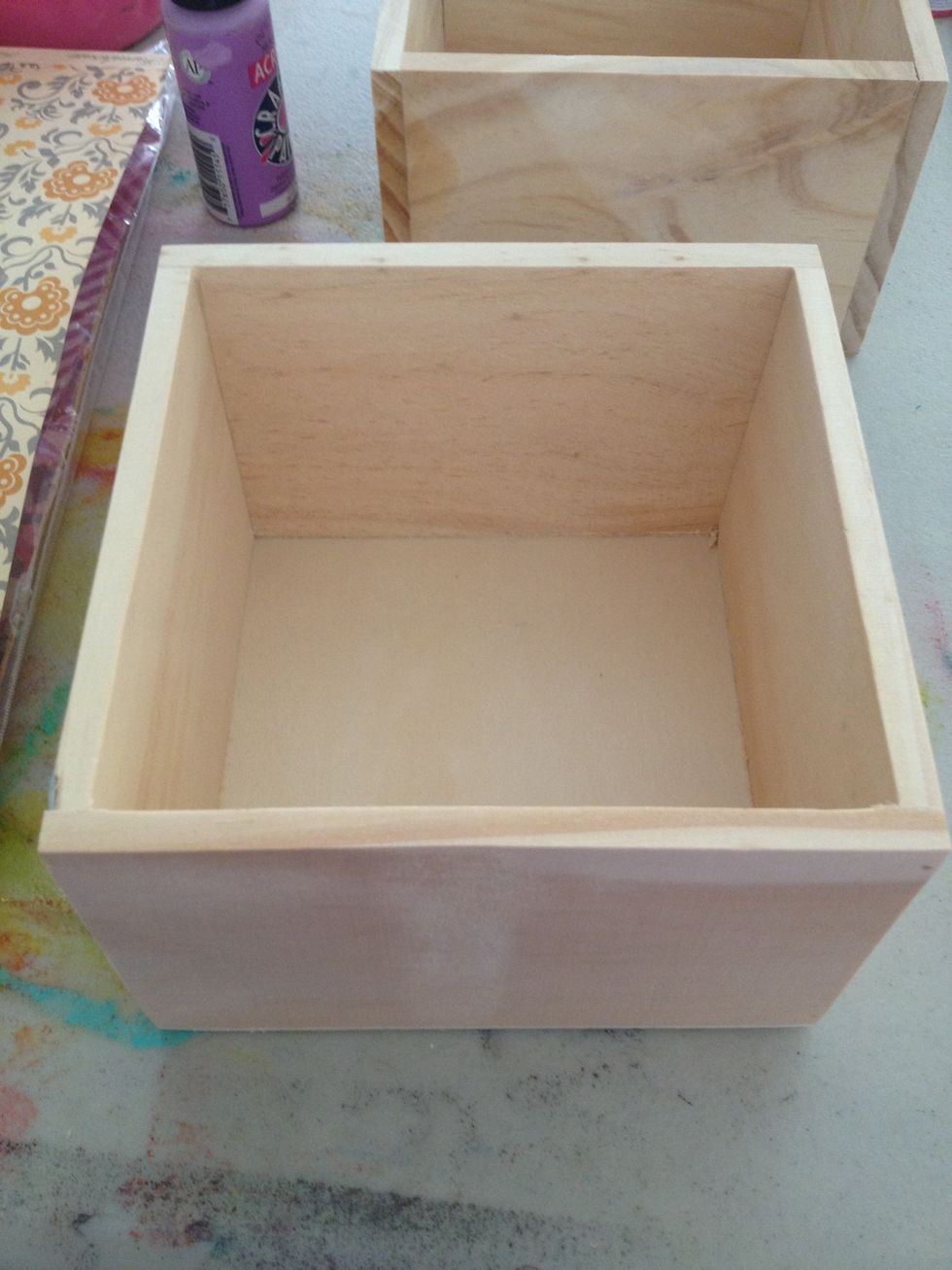 I am starting with this plain wooden box that I found in the dollar spot at Target. It already pretty smooth, so I'm not going to sand it.
