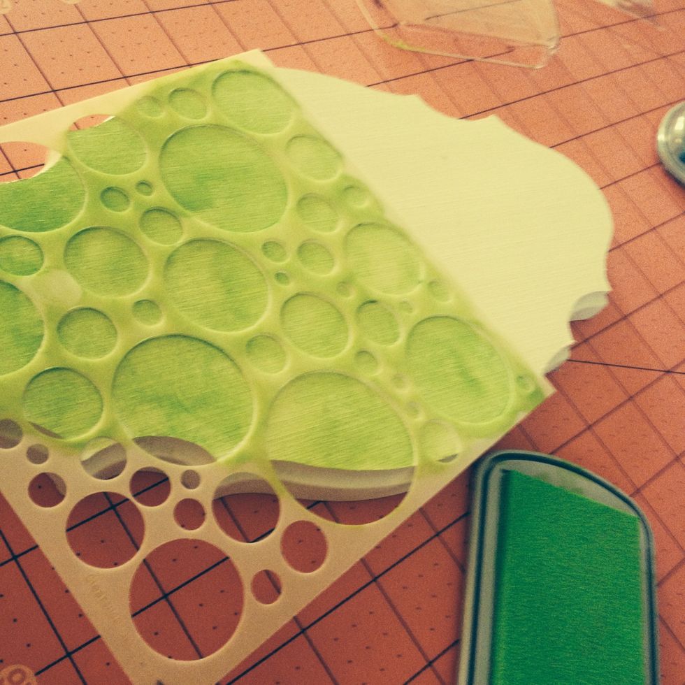I am using Colorboc Crafters Ink- specially for wood. I use the Clearsnap stylus tip to dab and smear into every corner, making sure I don't get any go over the end of the stencil