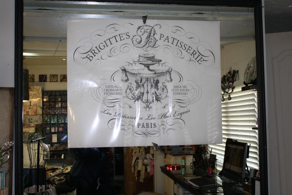 I am using the amazing new IOD Decor Transfers on this plain mirror wall in my craft room. I didn't want to cover the mirror, so this was PERFECT! I taped it up first , just eyeballing the center.