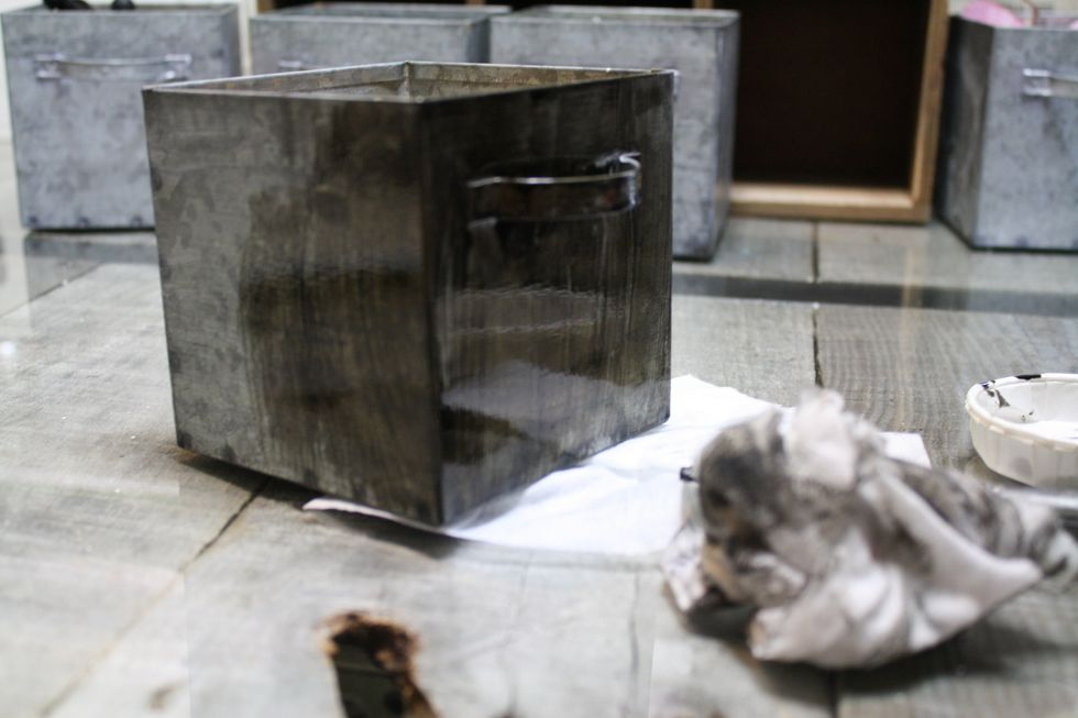 I applied 2 coats of the Decor Ink on my bins. Letting it dry for a bit, then buffing off areas with a baby wipe.