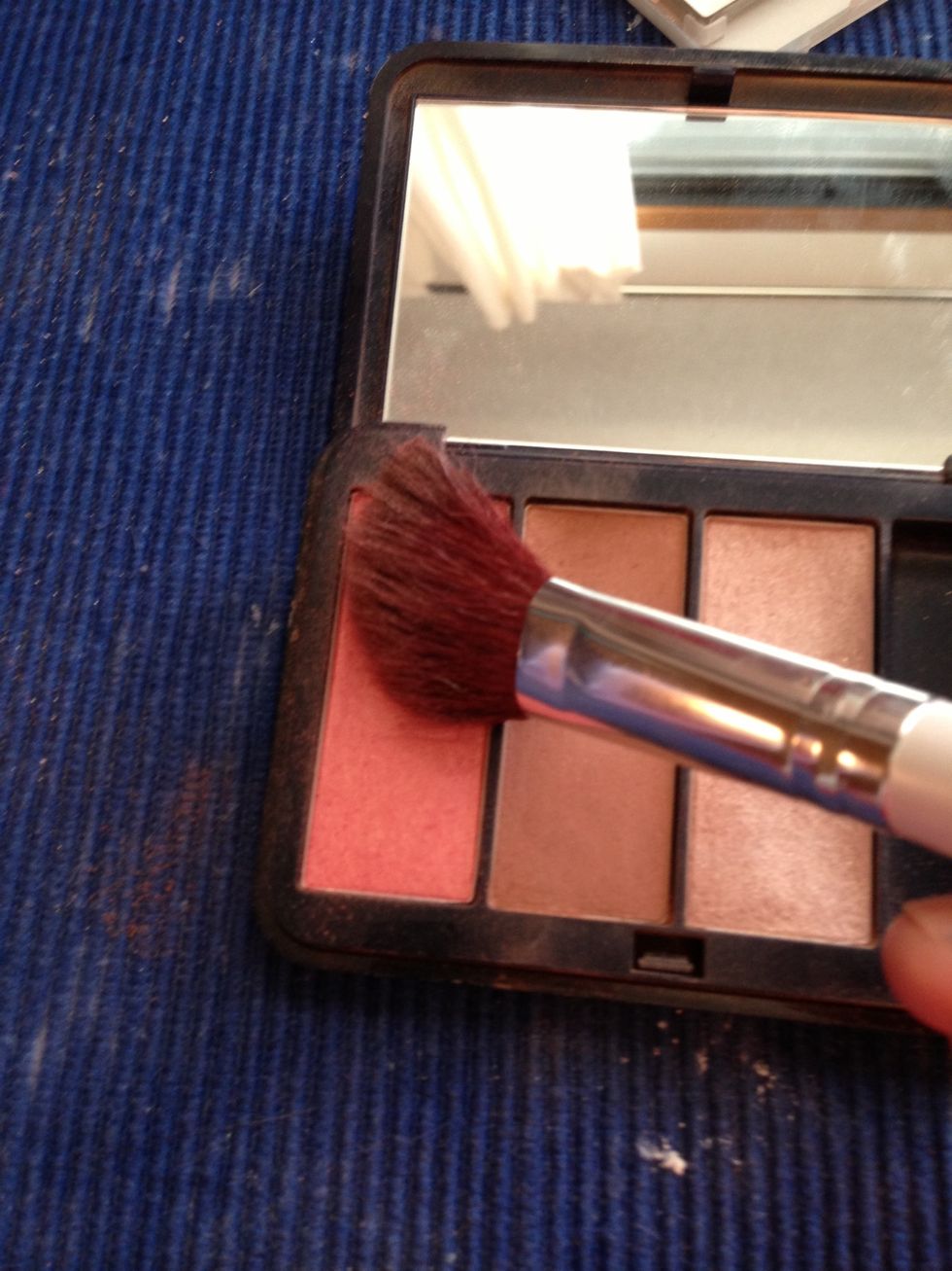 I apply blush right above my contour and blend up just a bit.