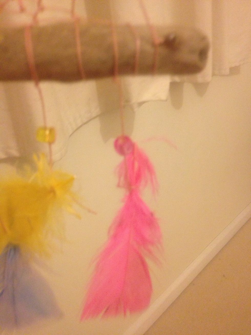 I attached the beads first then the feathers.