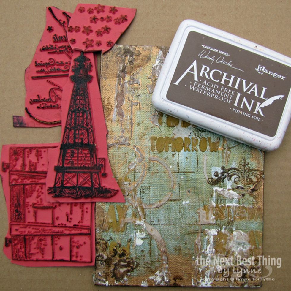 I began by applying a layer of Shimmer ing Matte Artist Acrylic Paint to a Canvas Panel. Then with stamps chosen from my Viva Las VegaStamps Pound O Rubber, I stamped randomly on the surface.
