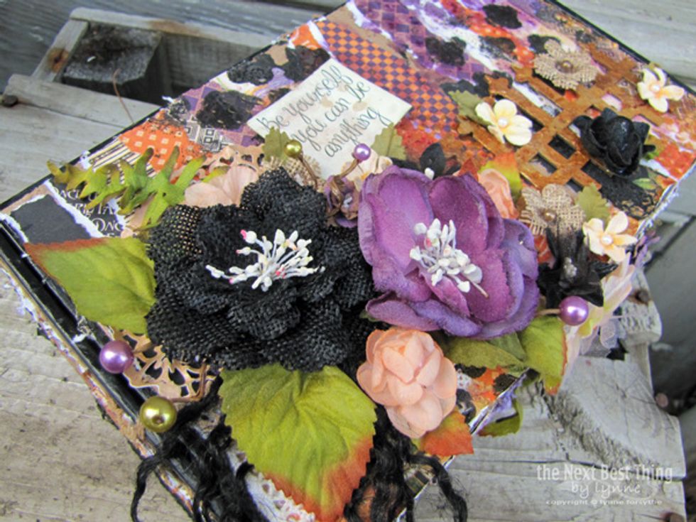 I began with a flower cluster on the top of the box of Textured Burlap flowers, Botanica beauties, and nestled in Berry Clusters and colored Darjeeling foliage.