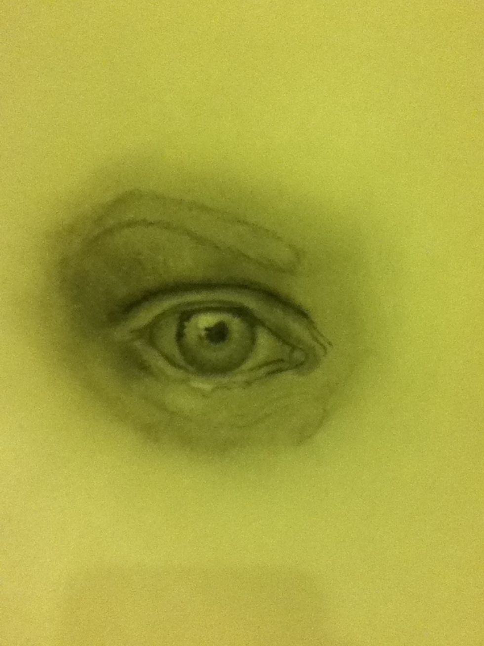 I began working on the skin. I put tones into the eyelid and the skin surrounding it.