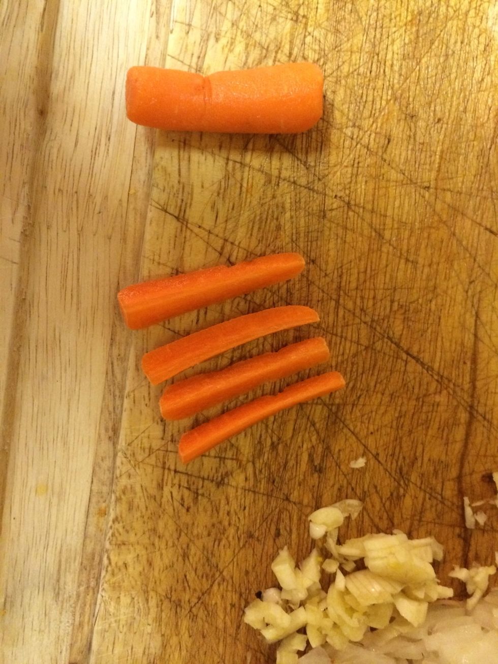 I chop my carrots like this. So cut it into 4s