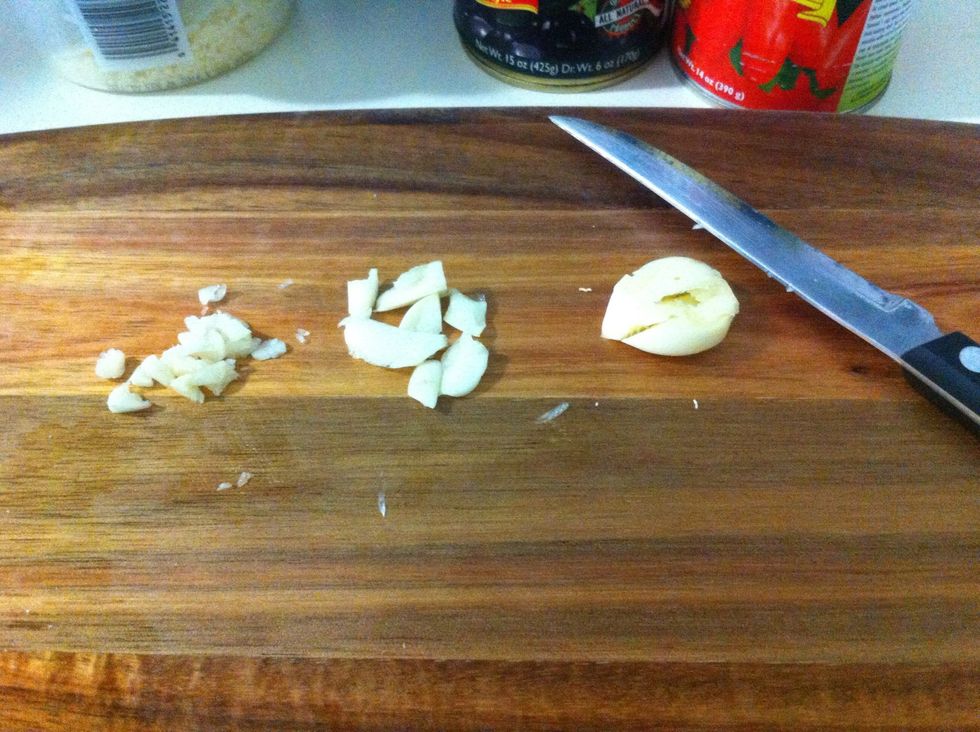 I chop one finely, break one up, and leave one whole, smashed clove