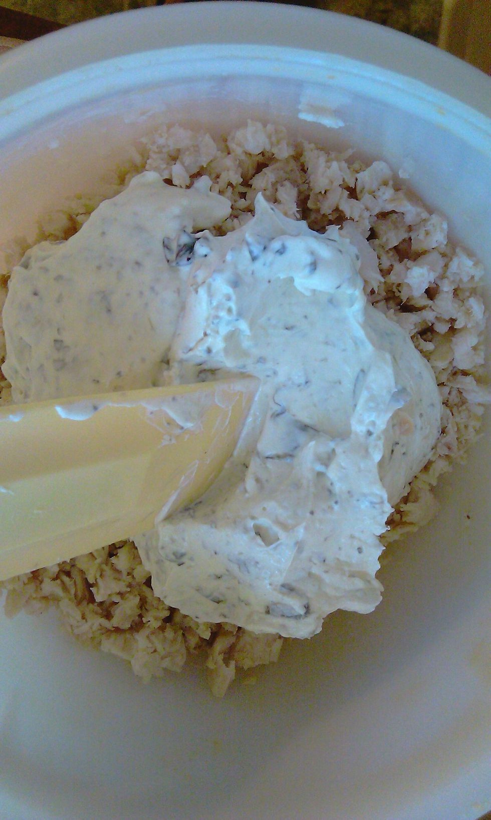 I chopped chicken using a food processor and then added the cream cheese.