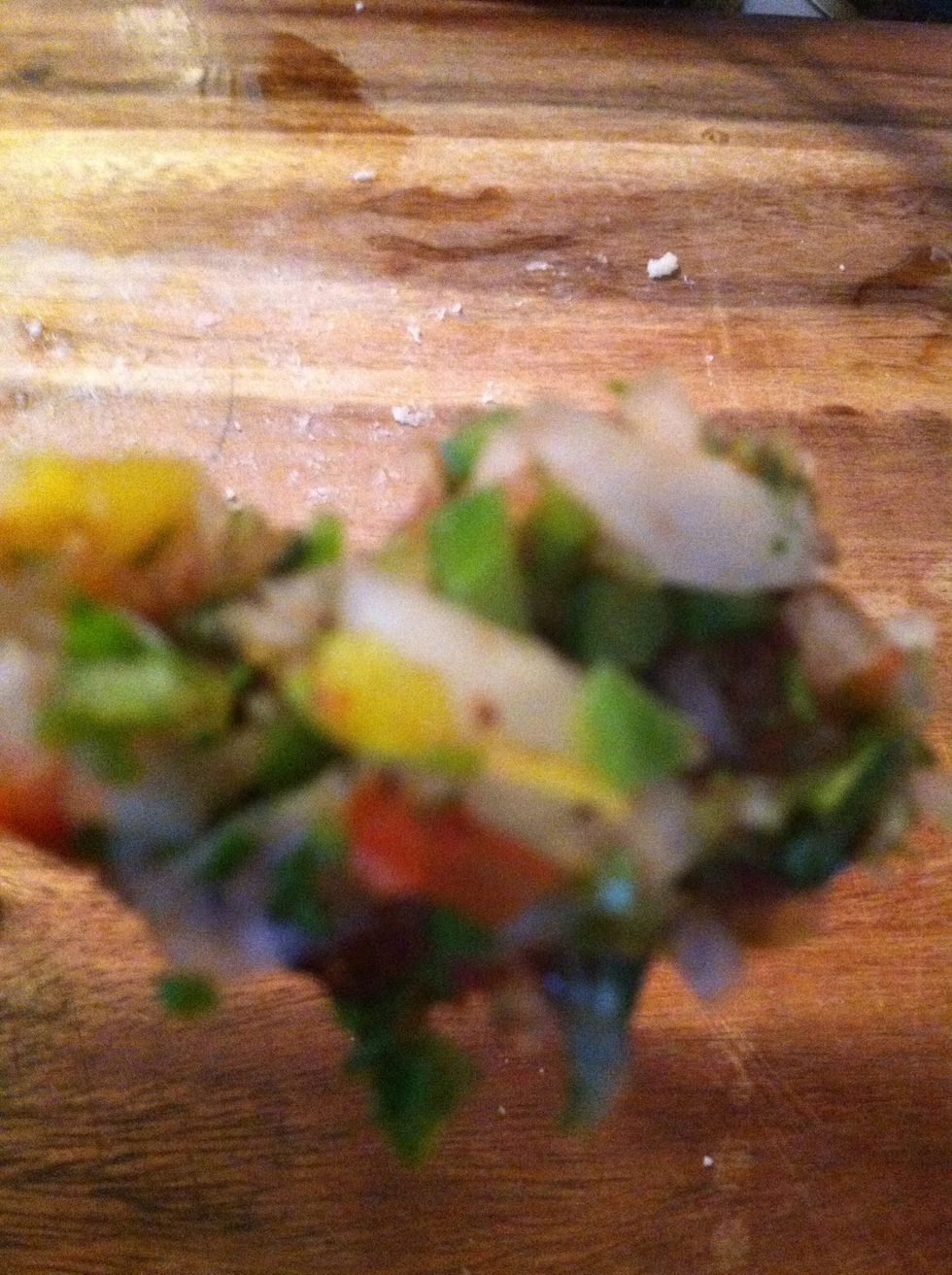 I chopped  my cilantro, onion,pepper,banana peppers, pepper juice, wine, chili, and topped off my arepa the possibilities are endless you can add anything ,enjoy! Tks to my hubby for helping me!