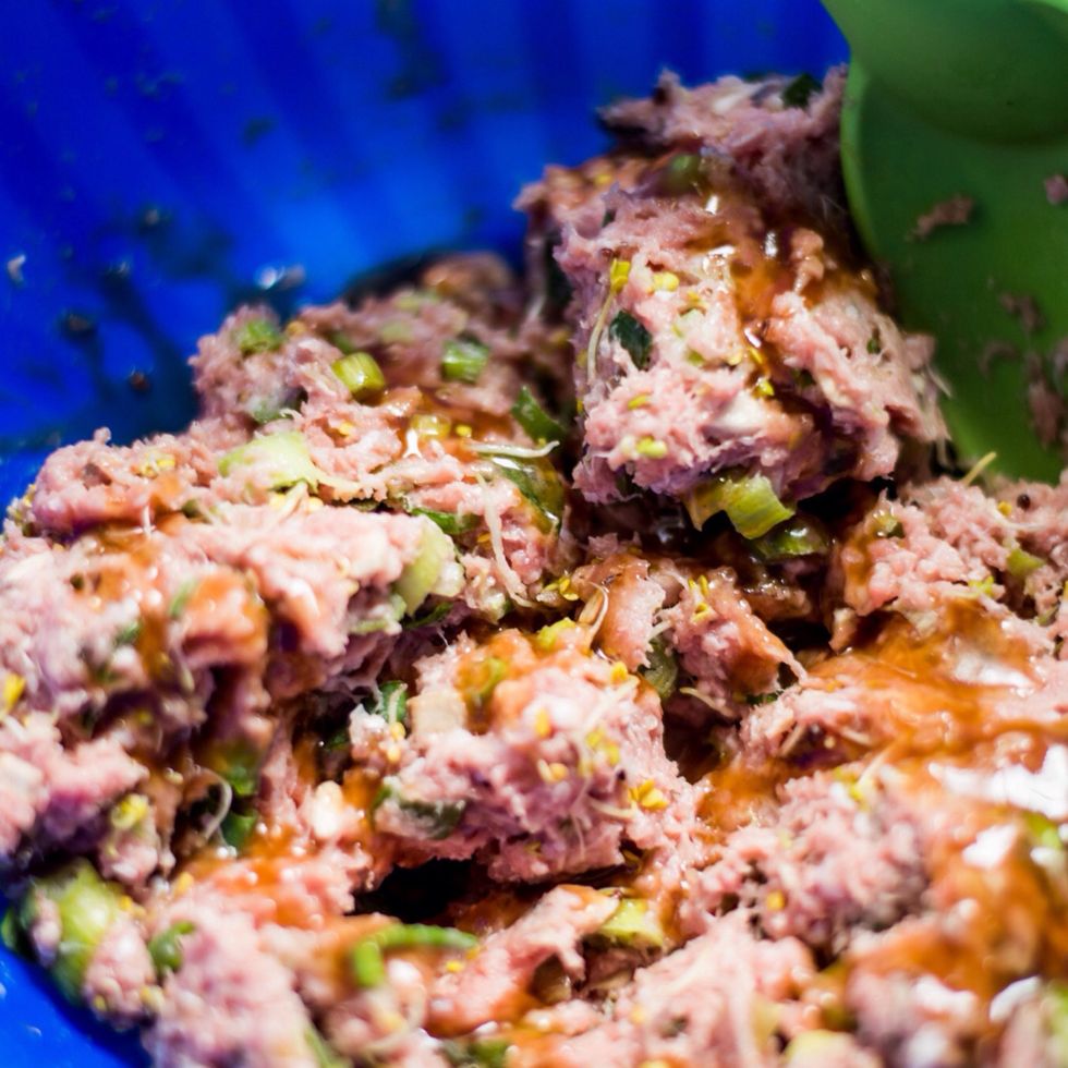 I chopped the kale spouts, onion, and mushrooms. Added it to the raw turkey, mixed well, then added the BBQ teriyaki sauce. I used my hands with gloves. I find it to be the best method!!!