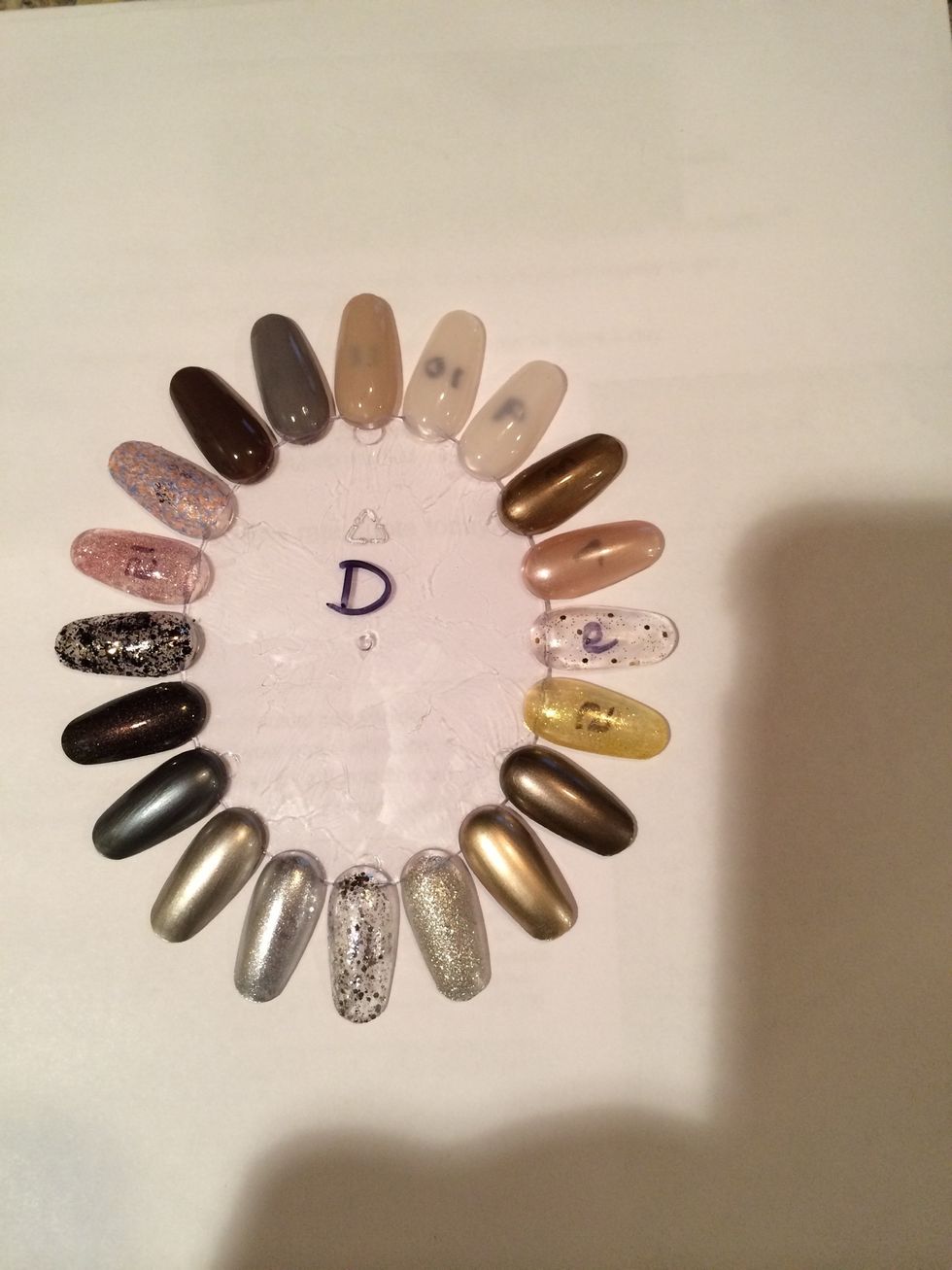 I chose the clear wheel for my glitter base polishes and lighter colors, so I could lay them over other colors and see their effect.